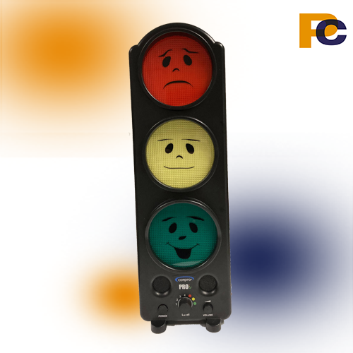 Lyskryds-lignende støjmåler. Sort ramme, rød cirkel med trist ansigt i toppen, gul cirkel med mellemtilfreds ansigt i midten, grøn cirkel med glad ansigt nederst . Knapper i bunden.